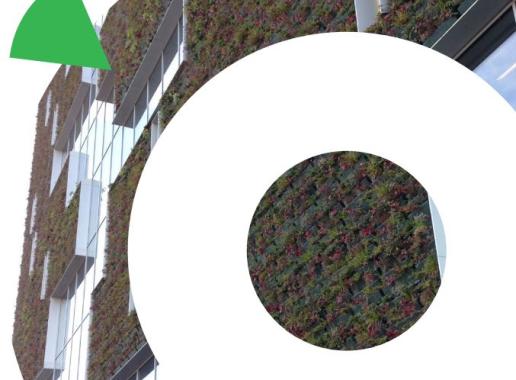 Grafische cirkels met foto van groen gebouw in Veenendaal