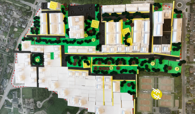 Model wijk met verschillende woning en groen blokken