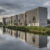 Laan van spartaan, 3 grote nieuwe gebouwen aan het water